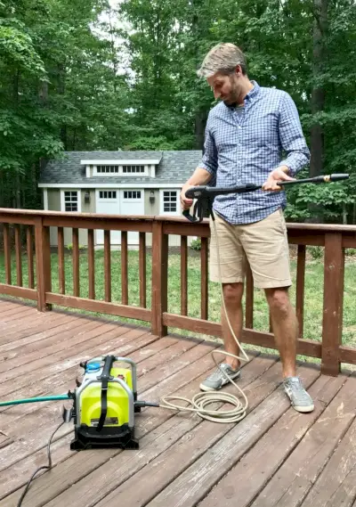 Hogedrukreiniger John met wasmachine