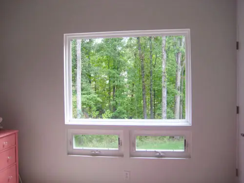 Cómo colgar cortinas para que la ventana parezca más grande