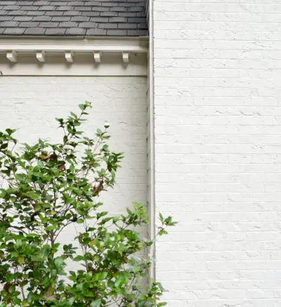 Photo En Gros Plan D'une Maison En Brique Peinte