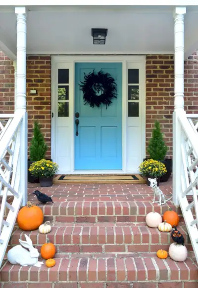 Front Porch Halloween Decor Pumpkins Blue Door Mums