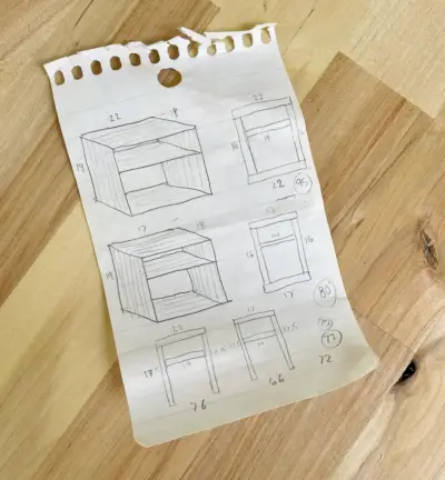 Croquis d'idées de table de chevet bricolage sur papier de cahier avec dimensions