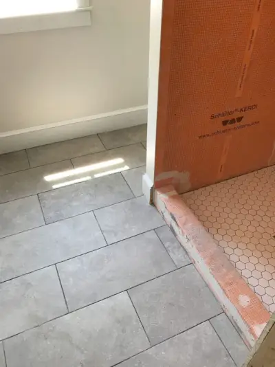 Salle de bain avec carrelage Beach House et douche