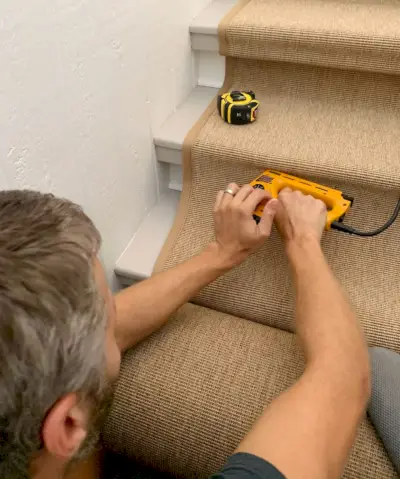 John Stapling Sisal Runner Under Lip of Stair Beh