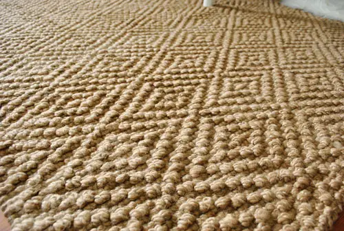 Detalle de la alfombra del dormitorio