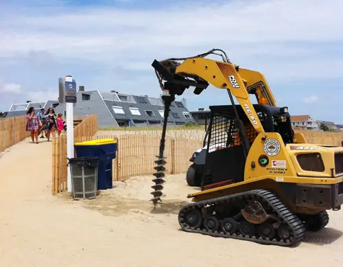 Escavador de dia de praia